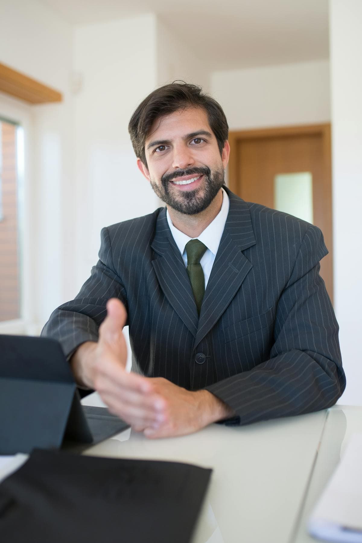 A smiling professional ready to welcome a customer
